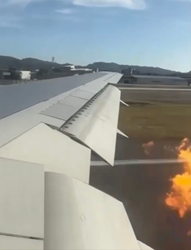 Footage is also taken from the plane showing the fire beneath the wing