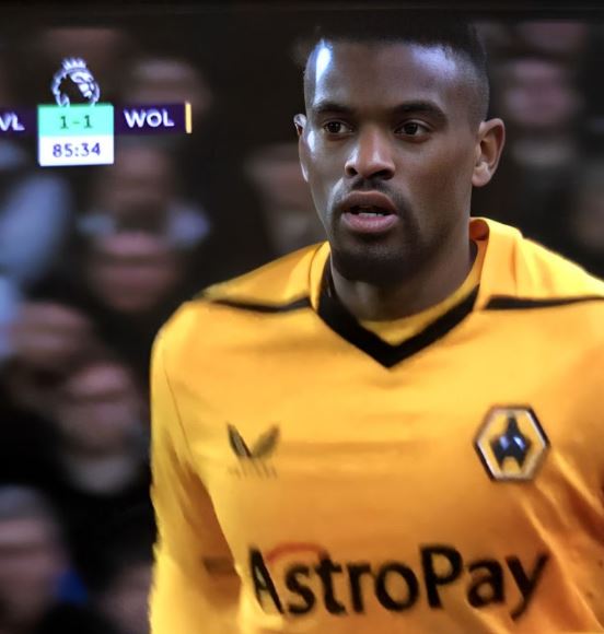 The right-back bizarrely took to the field with an upside down badge against Aston Villa