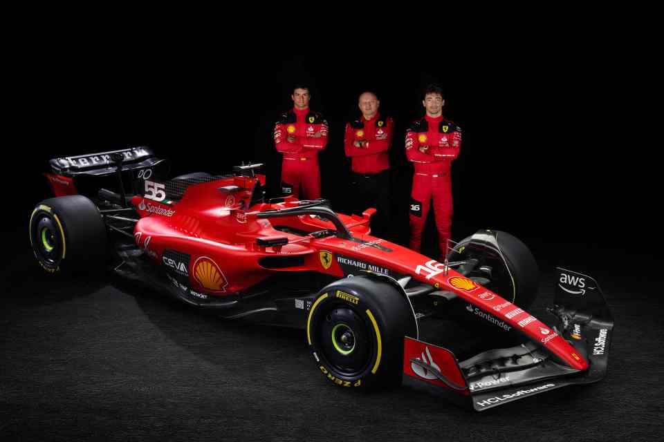 Ferrari drivers Charles Leclerc and Carlos Sainz alongside team principal Fred Vasseur.