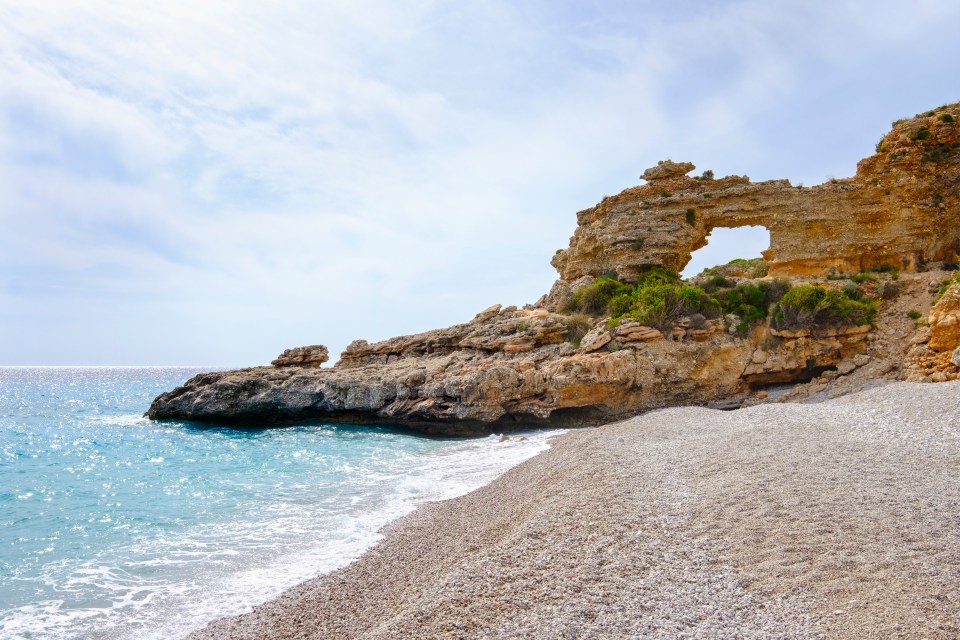 A rock arch on Dhermi Beach