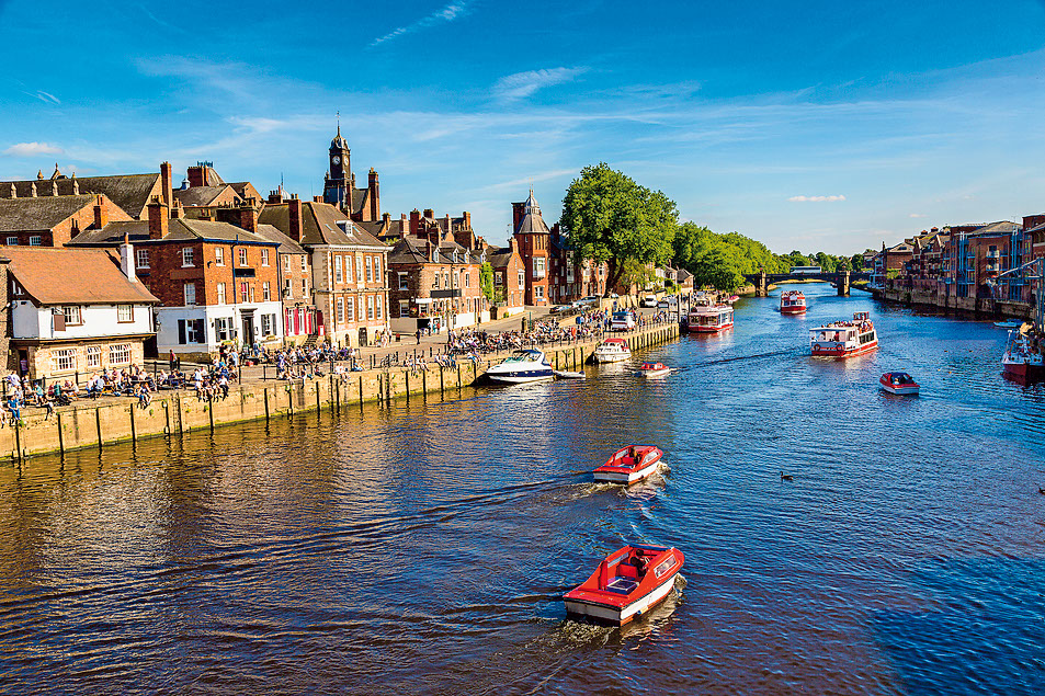 Hop on a self-drive boat along the river Ouse to admire the city from the water