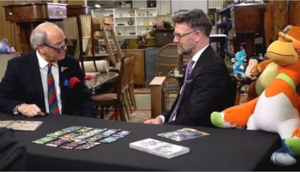 Charlie Ross showed Charles Hanson a rare Pokemon card collection