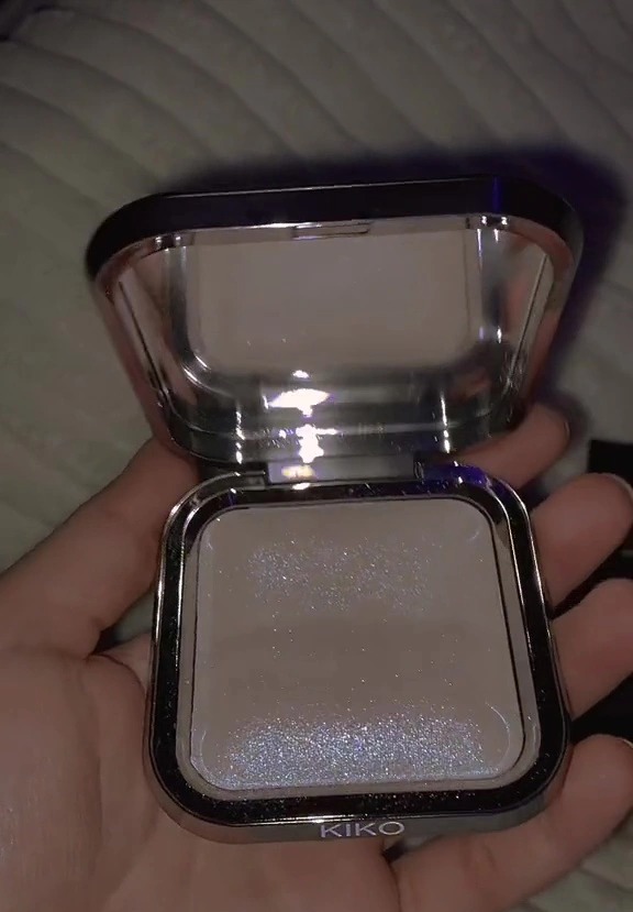 Kiko’s Glitter Baked Highlighter has been dubbed "the same as" Fenty Beauty's Diamond Bomb All-Over Diamond Veil