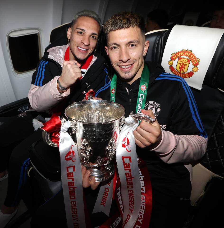 Antony fist pumps as Lisandro Martinez holds the Carabao Cup