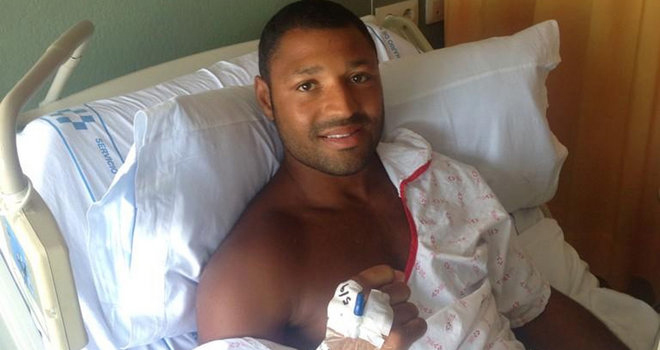 Kell Brook lays in his hospital bed after being stabbed in the leg while on holiday