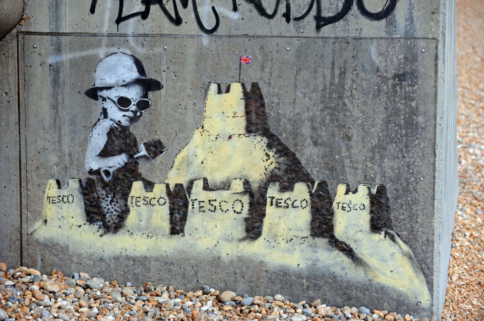 This work by Banksy on St Leonard’s seafront now has a protective cover on it