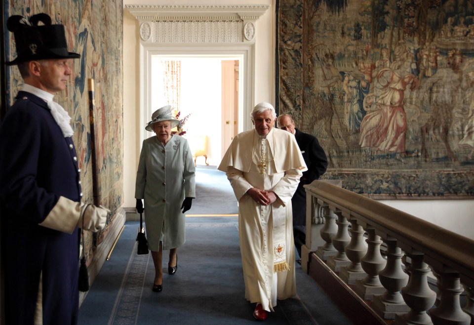 The late Queen and Pope Benedict XVI walking into the Morning Drawing Room