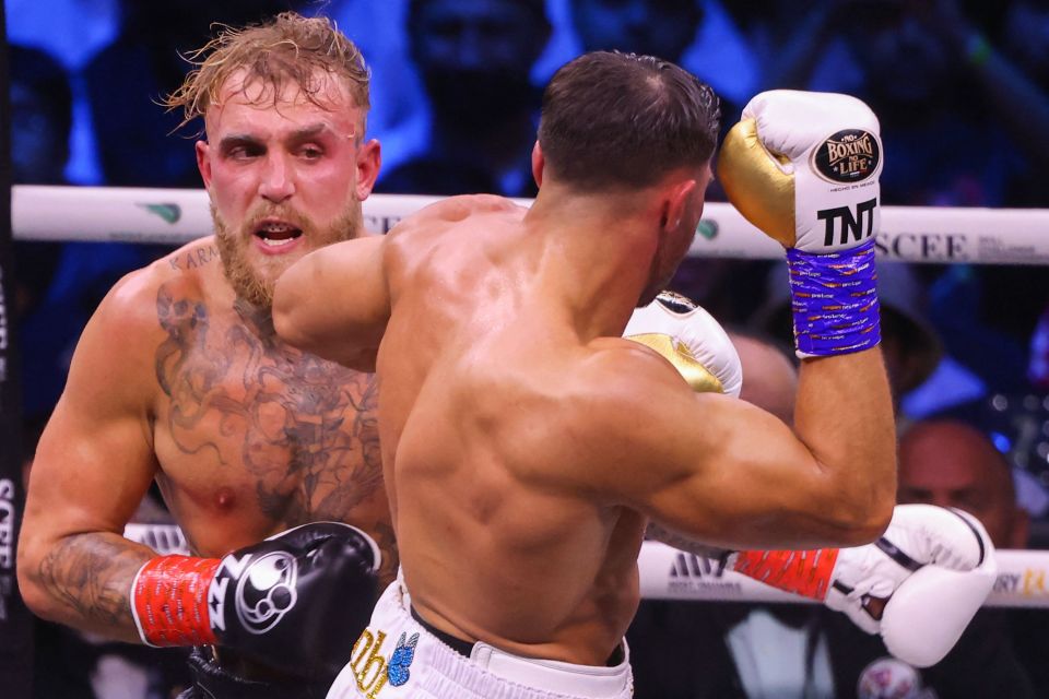 Tommy Fury and Jake Paul in action