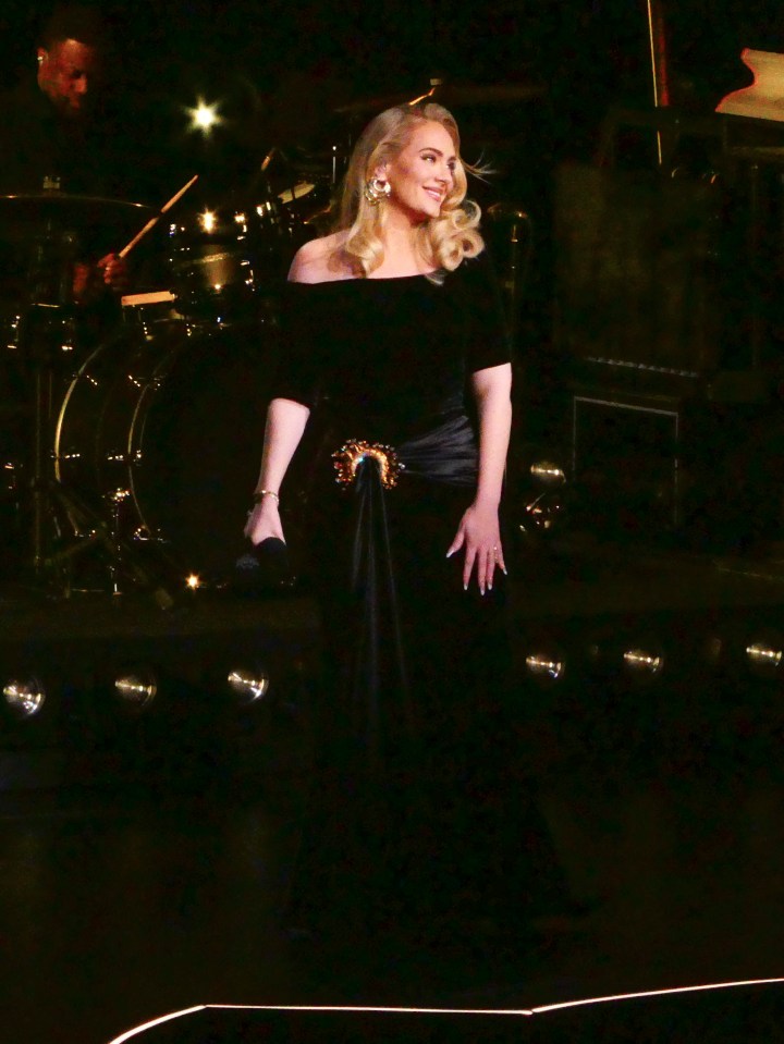 Adele looked stunning in a black gown with her hair swept over to one side