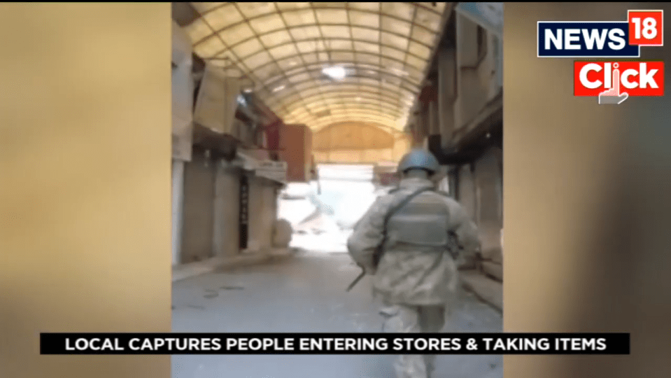 Military and local shopkeepers have been guarding their storefronts