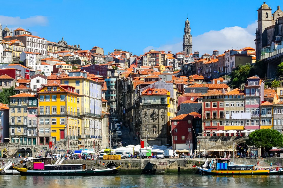 Porto is a "gorgeous city" known for its architecture, historic wine cellars, and riverbank location along the picturesque Douro River