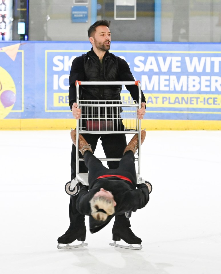 DOI pro skater Sylvain Longchambom grips onto the trolley while spinning around