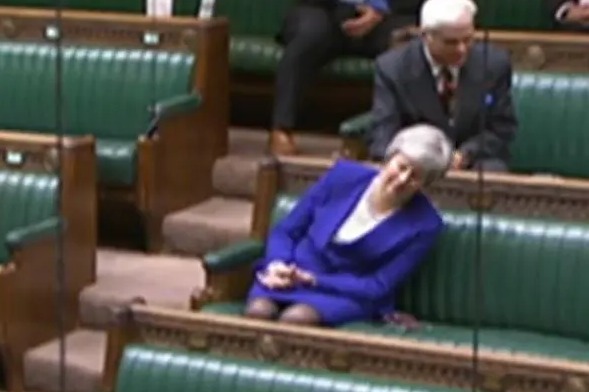 Theresa May pretended to doze off during a Commons debate