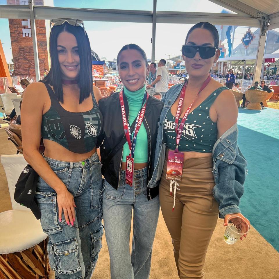 She posed with the Bella Twins at the Super Bowl