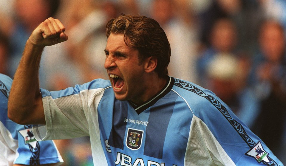 Darren Huckerby celebrates scoring for Coventry City in the Premier League.