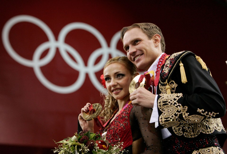 Russian ice dancer Roman Kostomarov, right, is in a critical condition in hospital