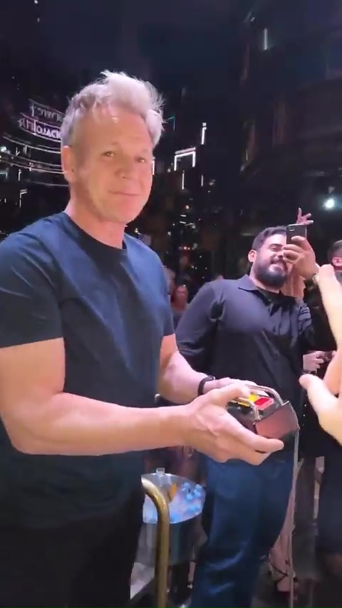 Gordon Ramsay was given the important task of firing the smoke cannons into the crowd