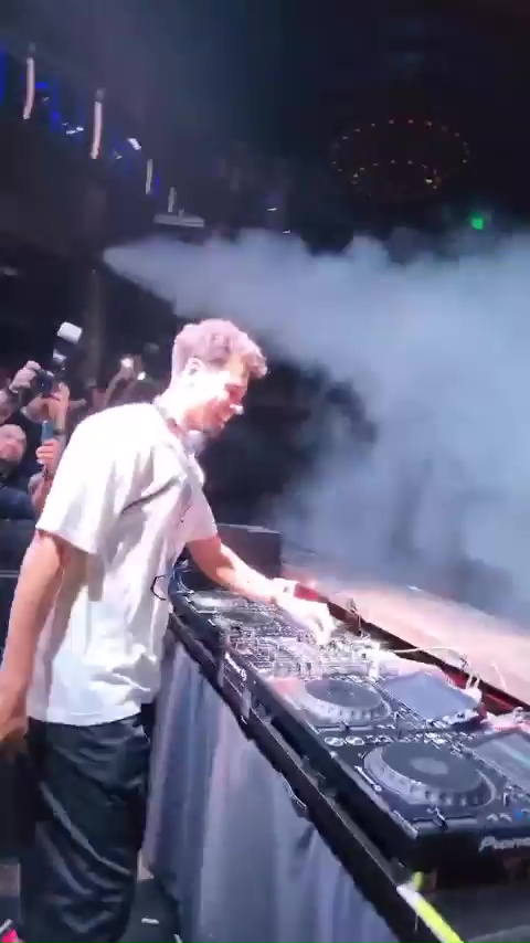 Afrojack looked impressed with Gordon's stage presence as the crowd went wild