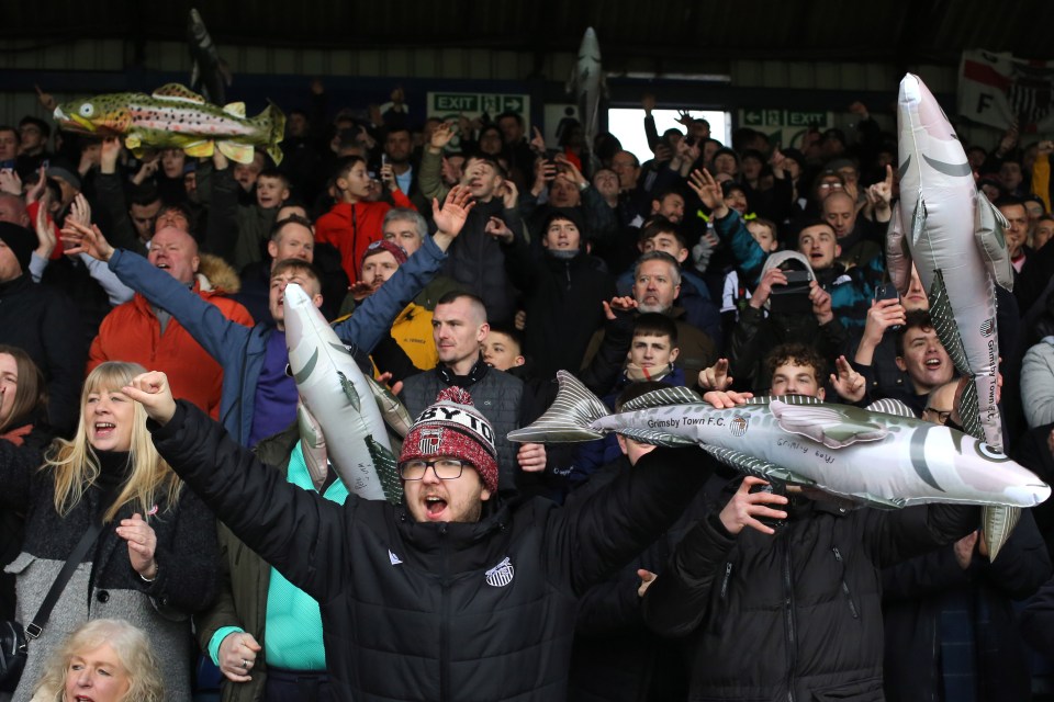 A ban on Grimsby Town fans taking their inflatable fish mascots to an FA Cup showdown has been lifted