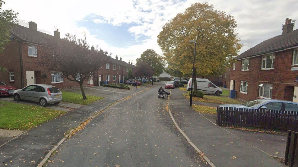 A woman died in a horror blaze in a flat in Chorley