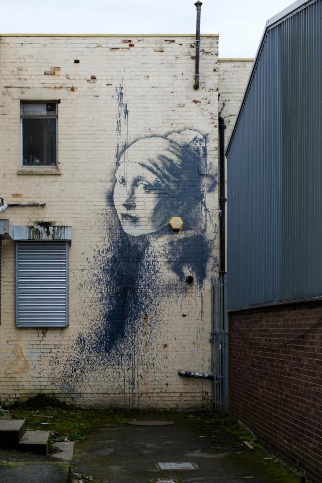 Banksy painted Girl with the Pierced Eardrum in 2014