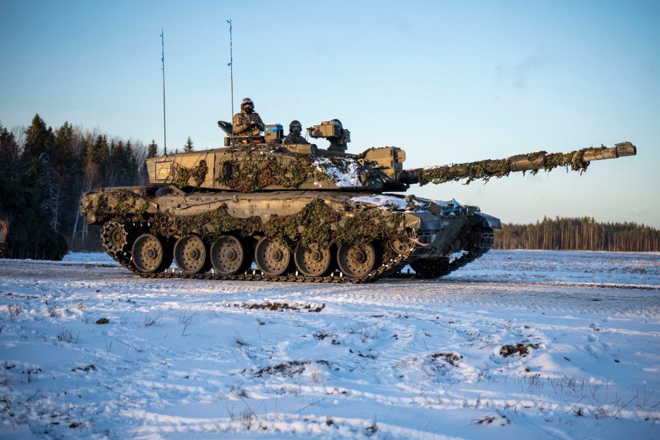 The Challenger 2 tank rumbles through the snowfields of Estonia