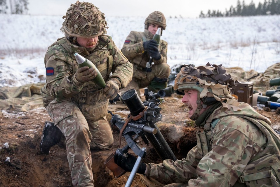 Scottish Guards fire mortars during the Nato drills in Estonia