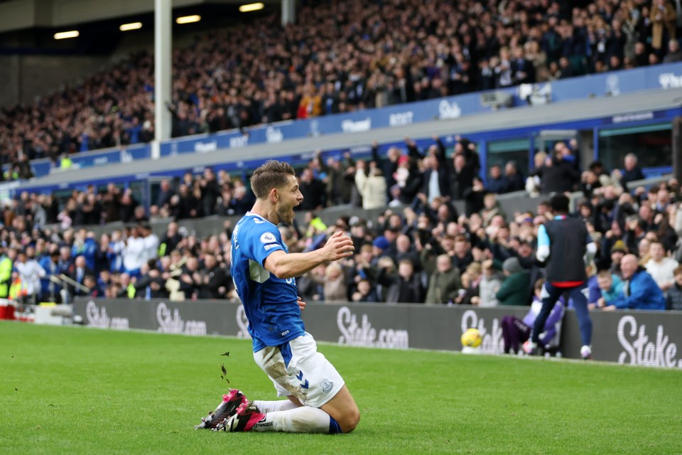 The defender celebrates with the crowd