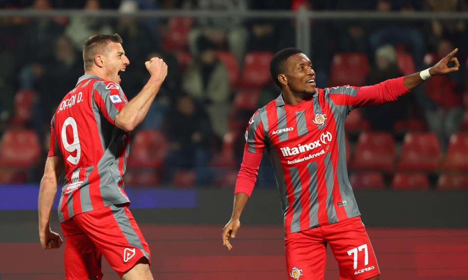 Daniel Ciofani, left, enjoys his winner along with Cremonese team-mate David Okereke to leapfrog Sampdoria at the bottom