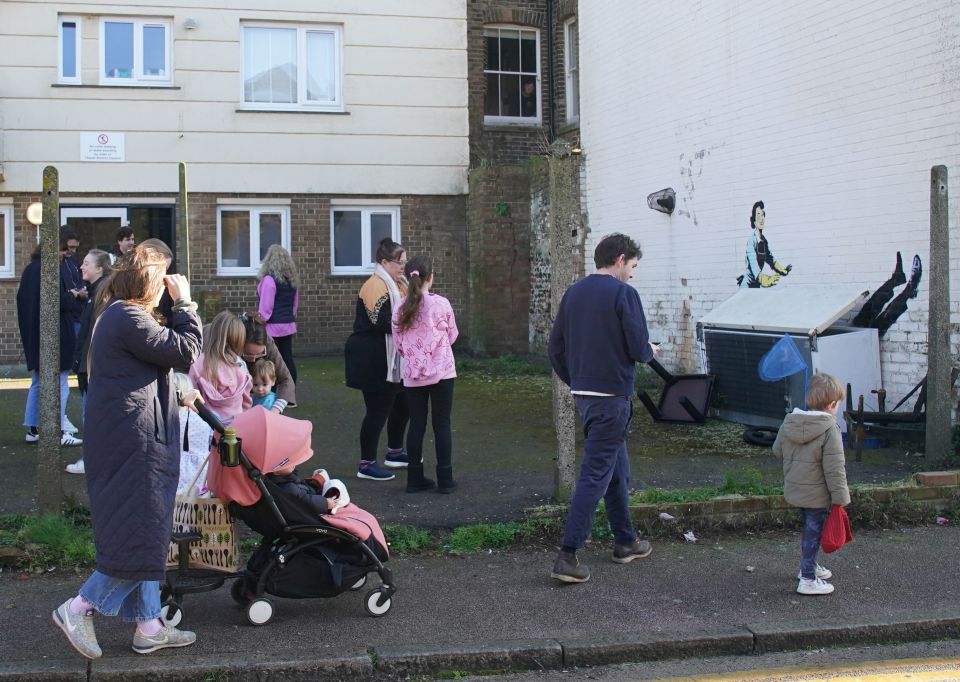 Locals had flocked to see the new Banksy earlier in the day