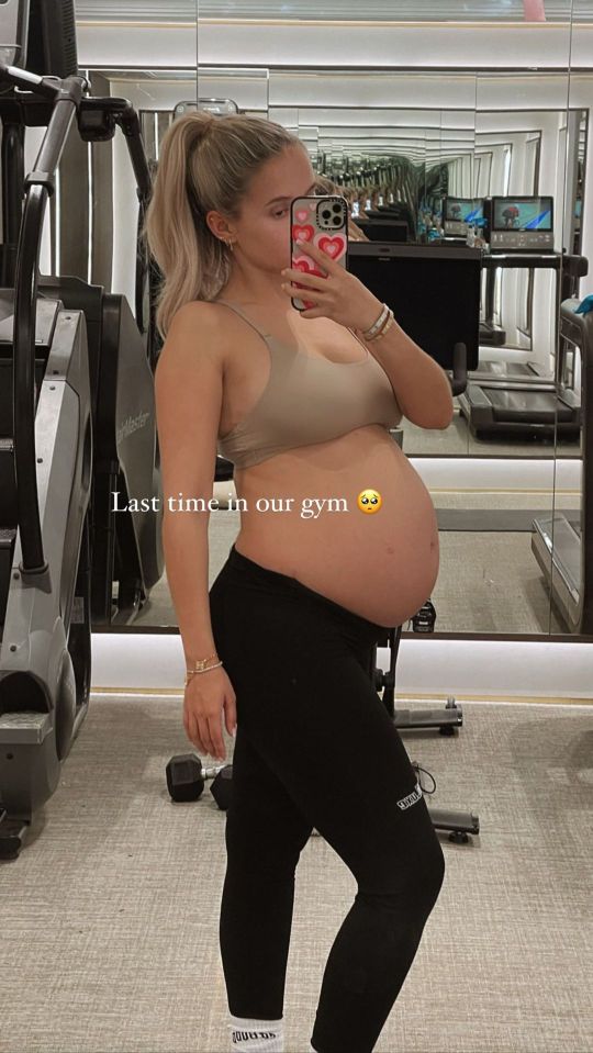 She shared a throwback image to being pregnant in the gym