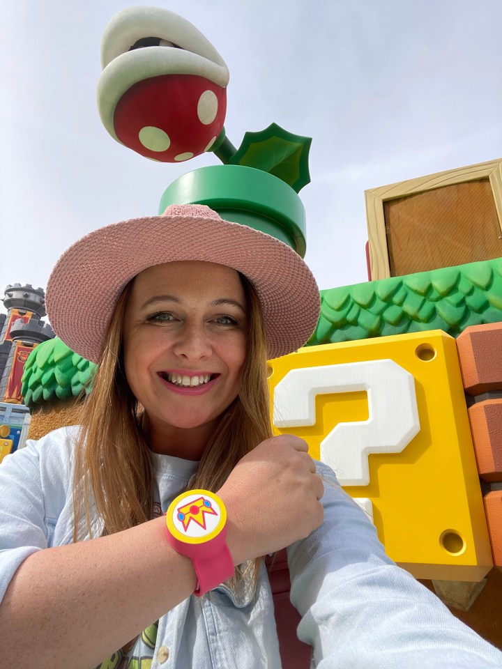 You can play games via a wrist band as you travel round Super Nintendo World