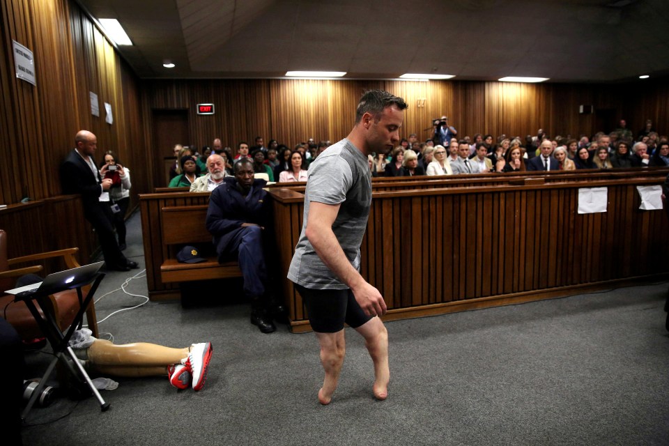 Pistorius walks across the courtroom without his prosthetic legs during the re-sentencing hearing