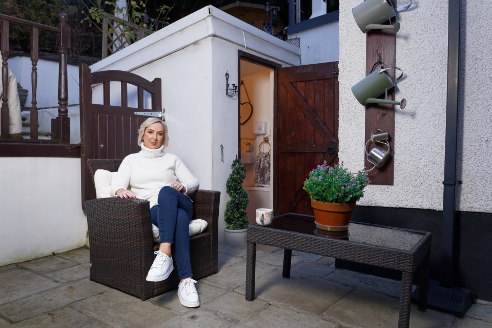 Pauline Cookson and her husband transformed her dream home's outhouse into a beautiful garden loo