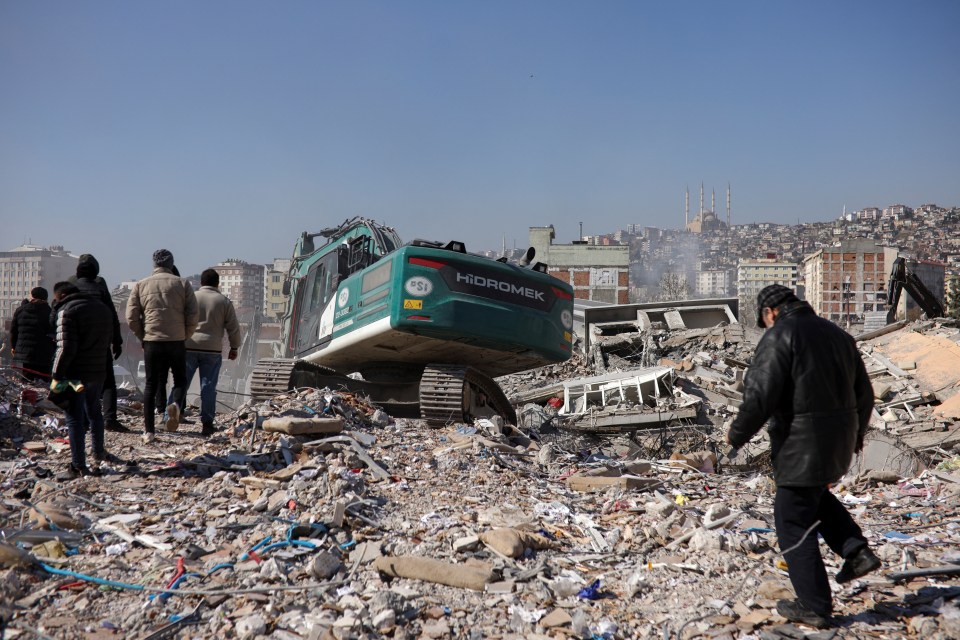 Diggers continue to shift through rubble today in Kahramanmaras, Turkey