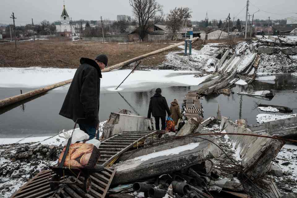 Civilians trapped within the city risk being killed by enemy fire as they travel to get water