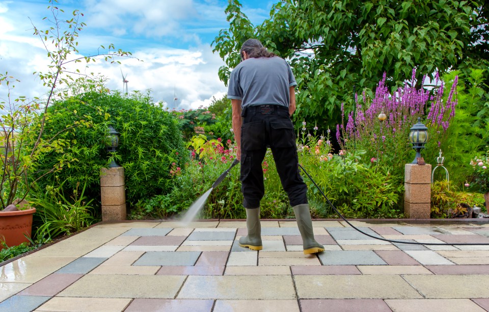 If you can borrow a pressure washer, this is a great way to clear patio areas