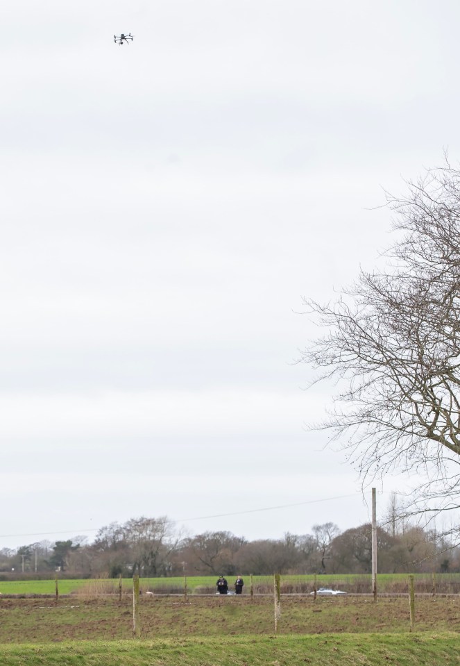 A drone flew overheard as police searched the river yesterday