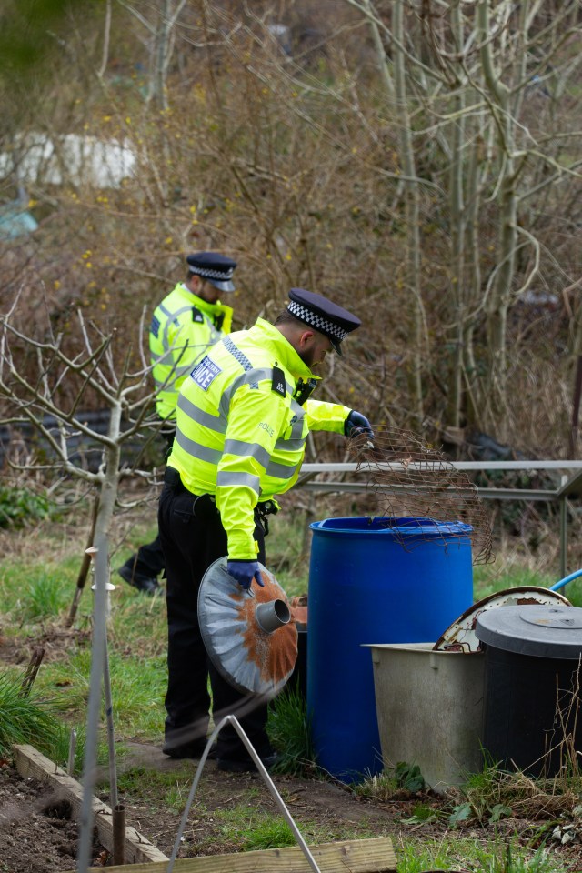 Officers were spotted searching under cars and behind bins in Stanmer Villas and nearby Roedale Valley Allotments