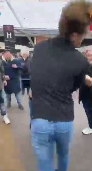 But another Hammers fan intervened to knock him out with a single blow