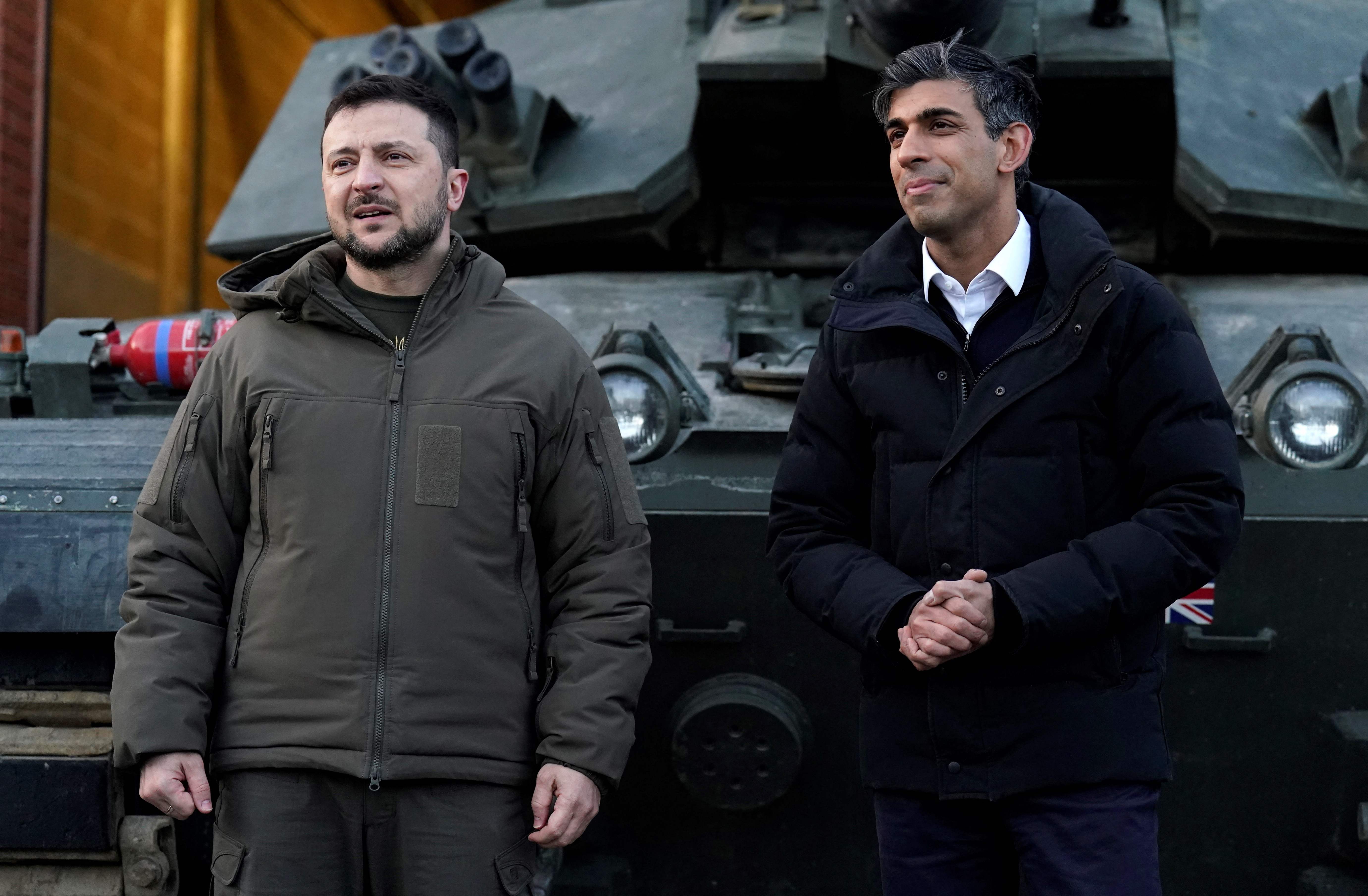 Zelensky and Sunak stand by one of the massive tanks in Dorset yesterday