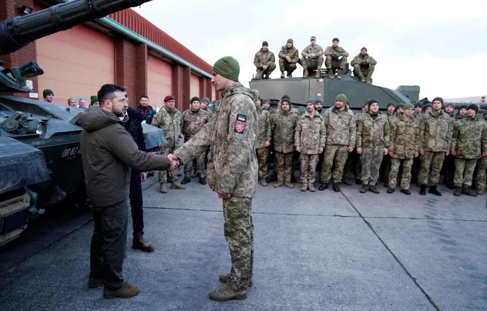 President Volodymyr Zelensky and Prime Minister Rishi Sunak meet Ukrainian soldiers being trained to operate Challenger 2s