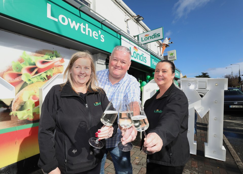 Store owner Seamus and Carol Lowthe (left) were delighted the winning ticket came from their store