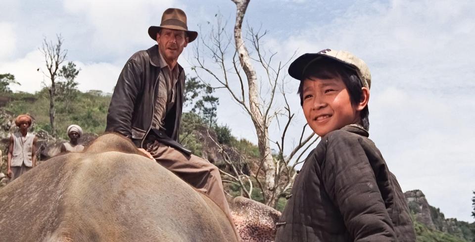 Harrison Ford with Ke Huy Quan in Indiana Jones and the Temple of Doom