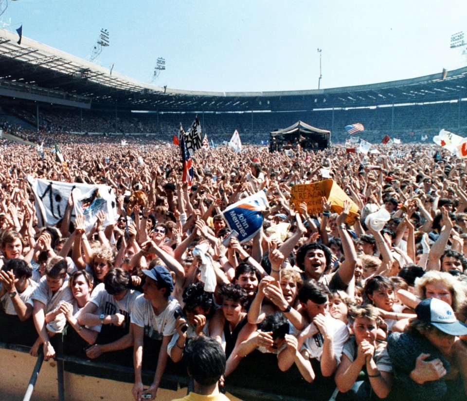 The 72,000-strong crowd at Wembley Stadium for the Live Aid famine relief concert in 1985