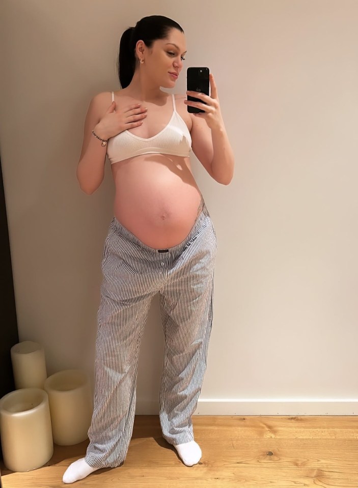 Jessie J showed off her growing baby bump at home