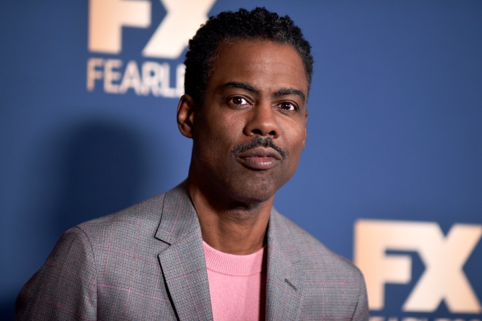 Chris Rock also roasted Will Smith over when the actor slapped him at last year’s Oscars