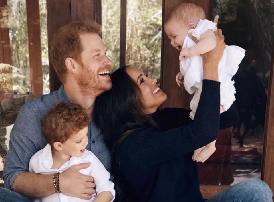 The couple with their children Archie and Lilibet