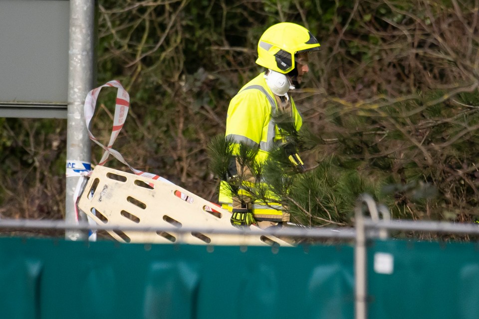 Emergency services at the A48 between Cardiff and Newport after the car of five missing people was found last night