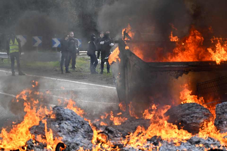 Protests have erupted after the French government pushed through a pensions reform